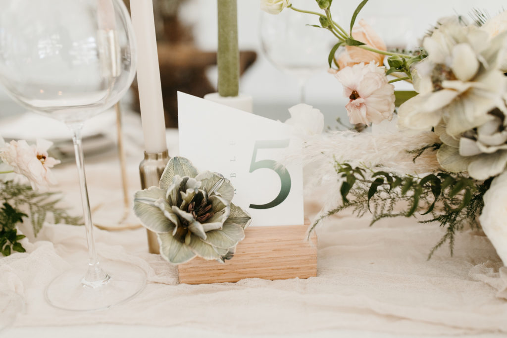 green table number with tulip