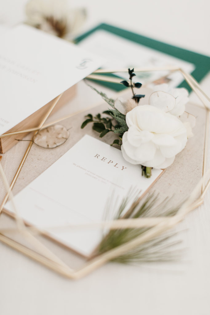 gold and emerald stationary for winter weddings